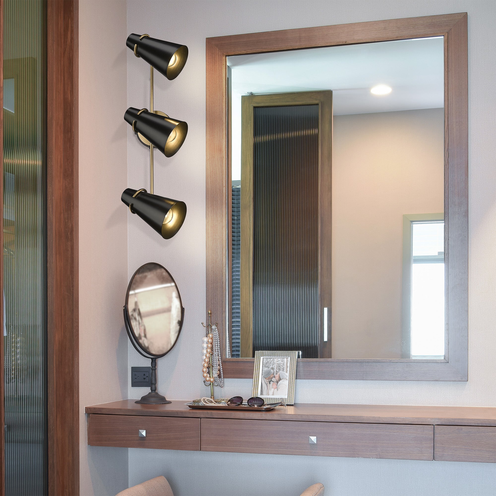 Golden Lighting Reeva 3-light Vanity in Modern Brass and Matte Black shade
