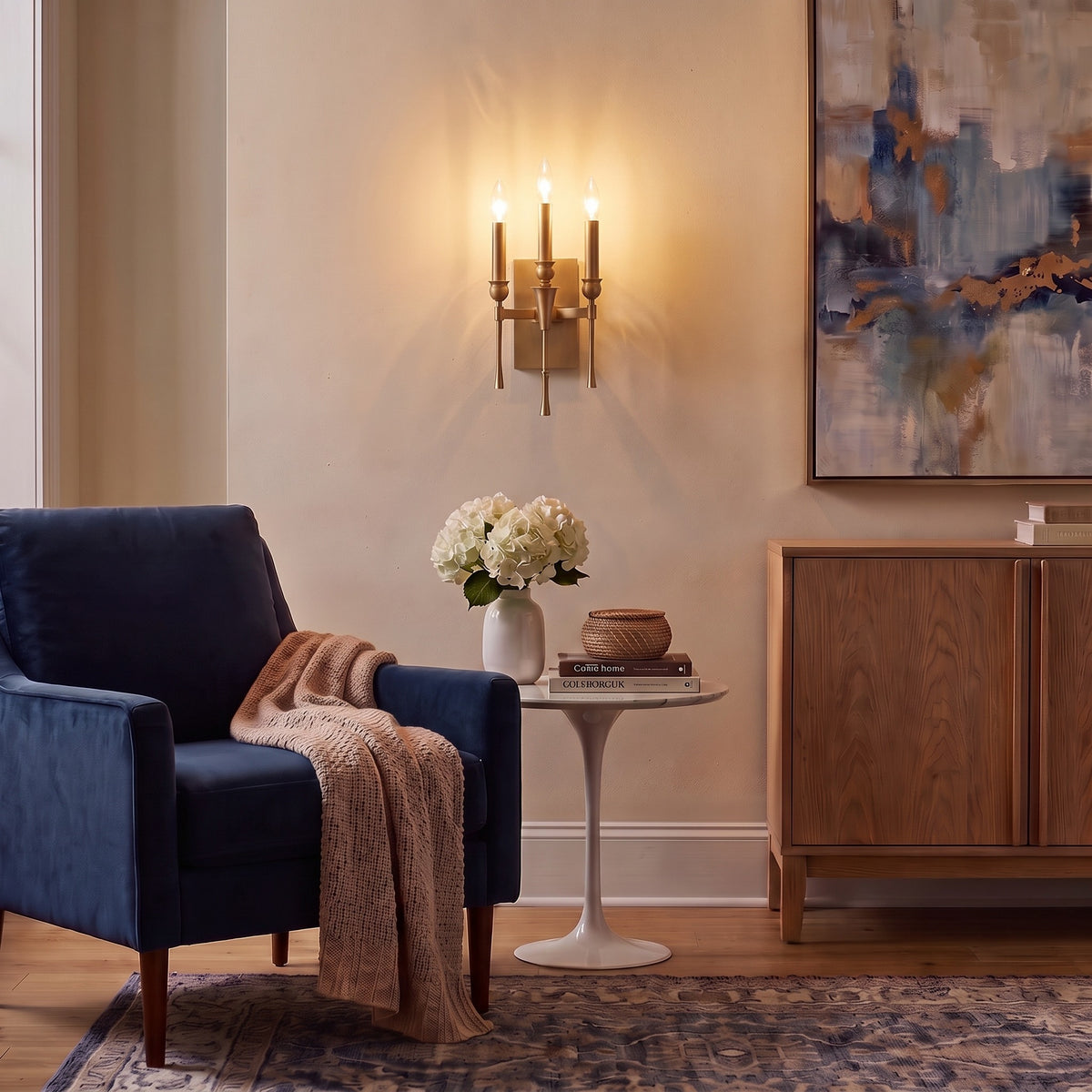 Landon 3-light Wall Sconce in Brushed Champagne Brass, AI-visualized living room scene - Golden Lighting