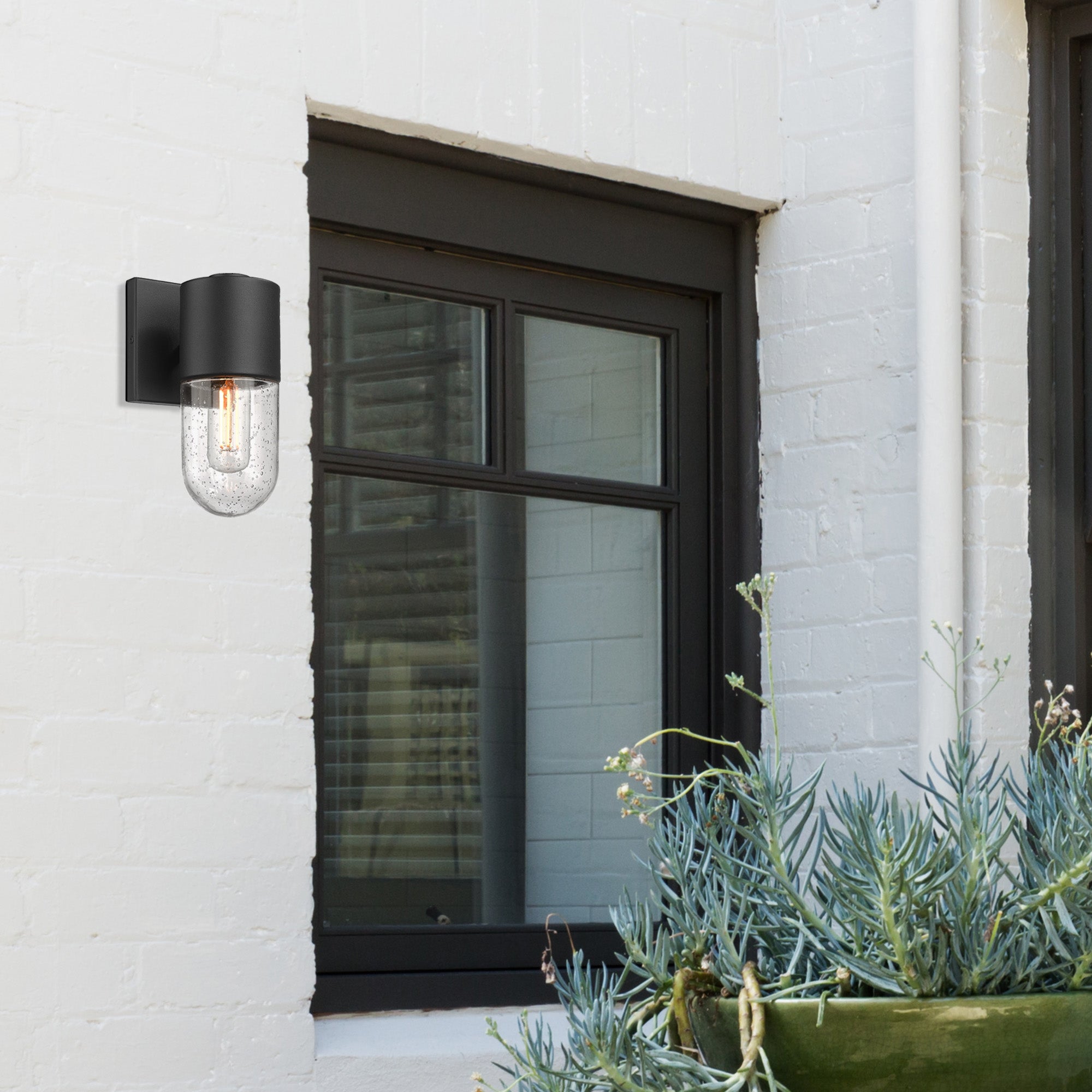 Ezra 1 Light Wall Sconce - Outdoor in Natural Black with Seeded Glass Shade - Default Title - Golden Lighting