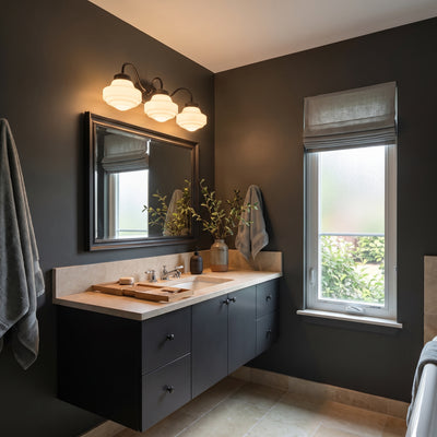 Ingalls 3-light Vanity in Matte Black, AI-visualized room scene - Golden Lighting