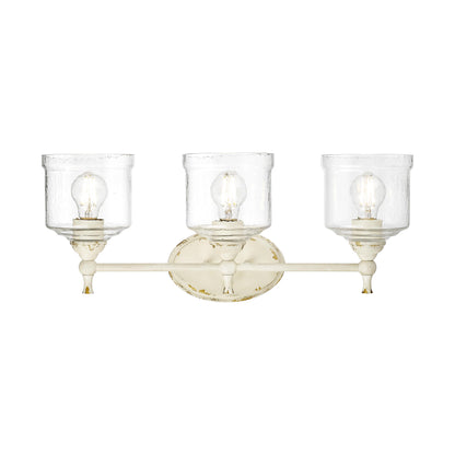 Keating 3 Light Bath Vanity in Antique Ivory with Hammered Water Glass Shade - - Golden Lighting