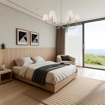 Cambria 6-light Chandelier in Polished Nickel & Pleated White Shades, shown in a room setting - Golden Lighting