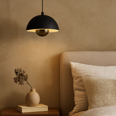 Vintra Integrated LED Pendant in Sand Black and Copper shade, shown in a room setting - Golden Lighting