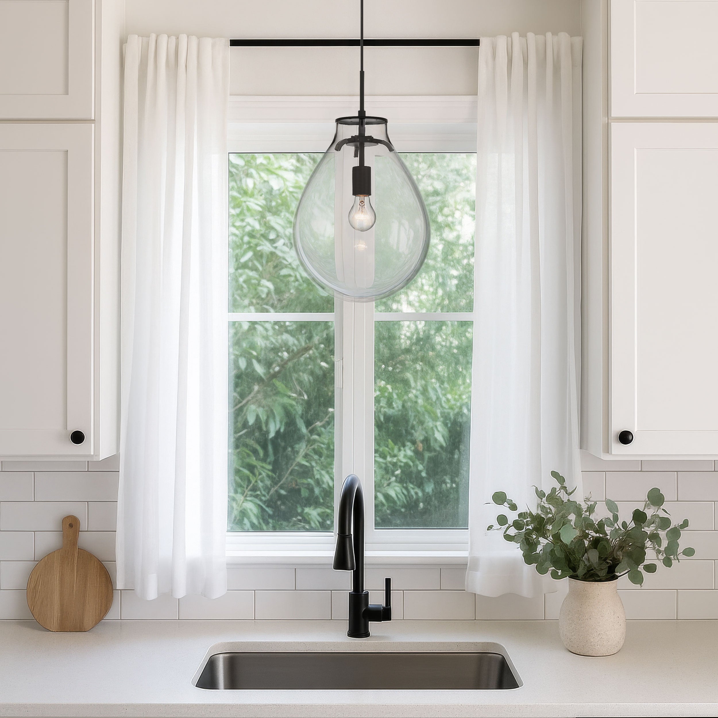 Drop 1-light Pendant in Matte Black and Clear Glass