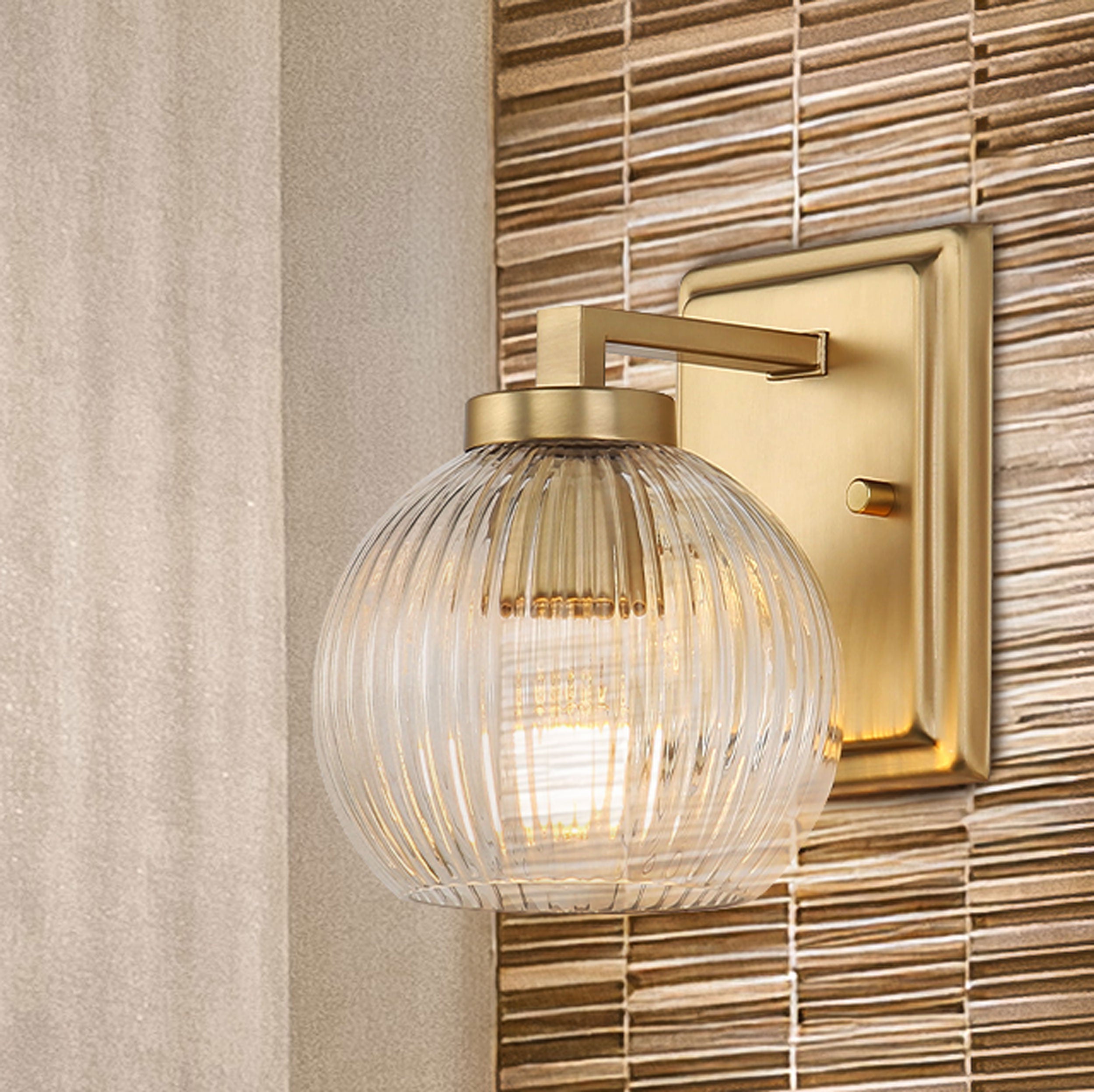 Yep by Golden Lighting Elliott 1-light Vanity in Brushed Champagne Brass and Clear Ribbed Glass - - Golden Lighting