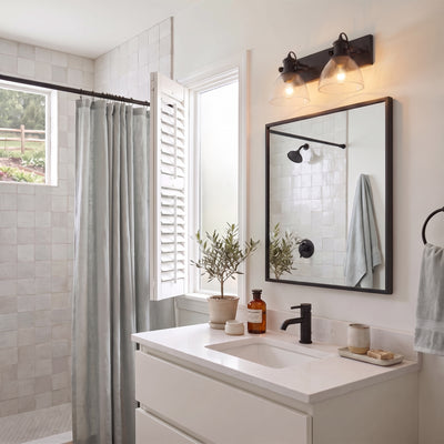 Hines 2-light Vanity in Matte Black, AI-visualized bathroom scene - Golden Lighting