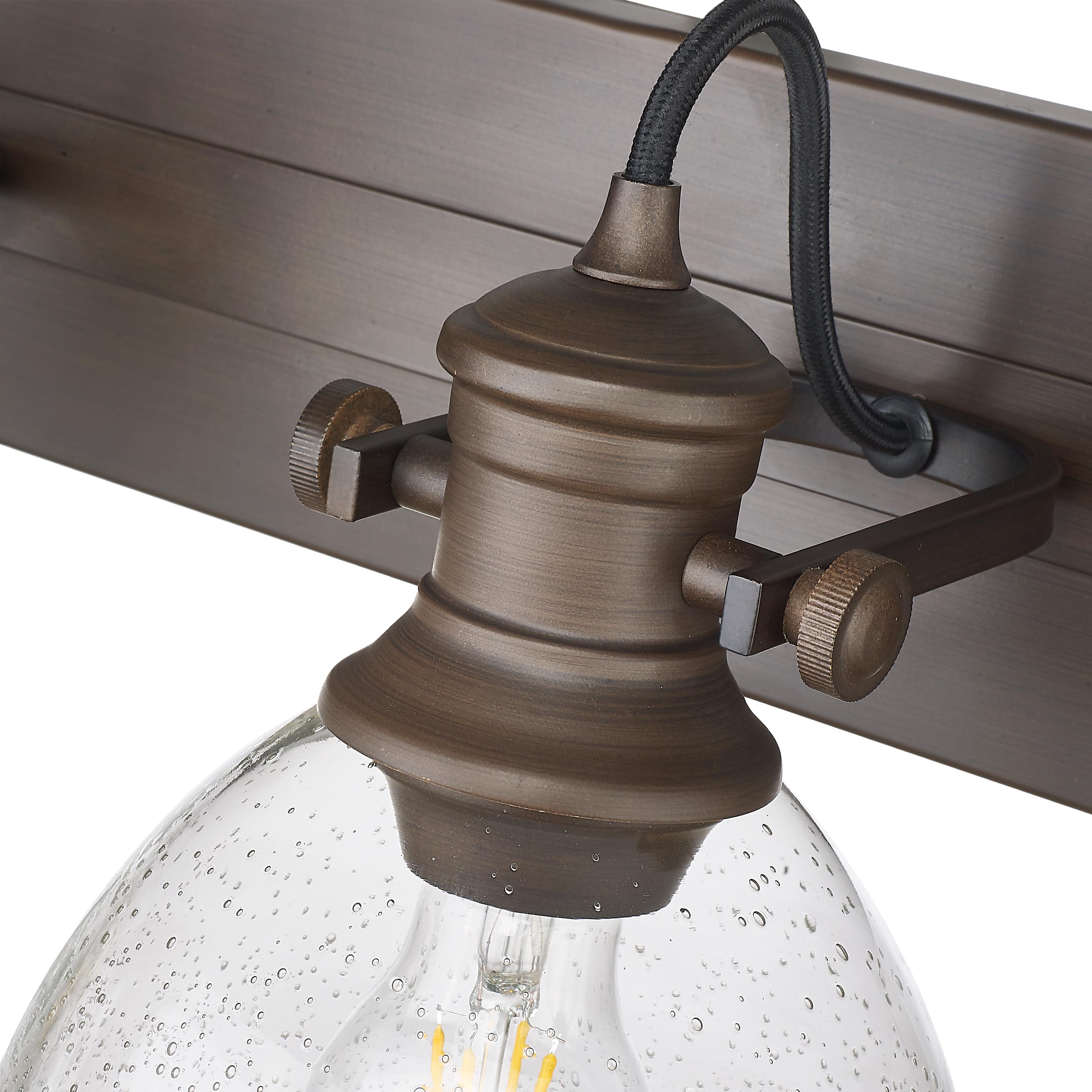 Yep by Golden Lighting Hines 4-light Vanity in Rubbed Bronze and Seeded Glass - - Golden Lighting