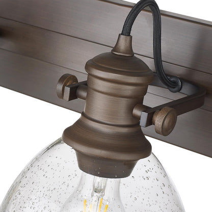 Yep by Golden Lighting Hines 4-light Vanity in Rubbed Bronze and Seeded Glass - - Golden Lighting