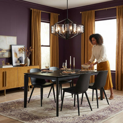 Varsha 6-light Chandelier in Matte Black, shown in a room setting - Golden Lighting