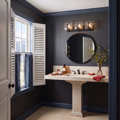 Aenon 3-light Vanity in Matte Black, AI-visualized powder room scene - Golden Lighting