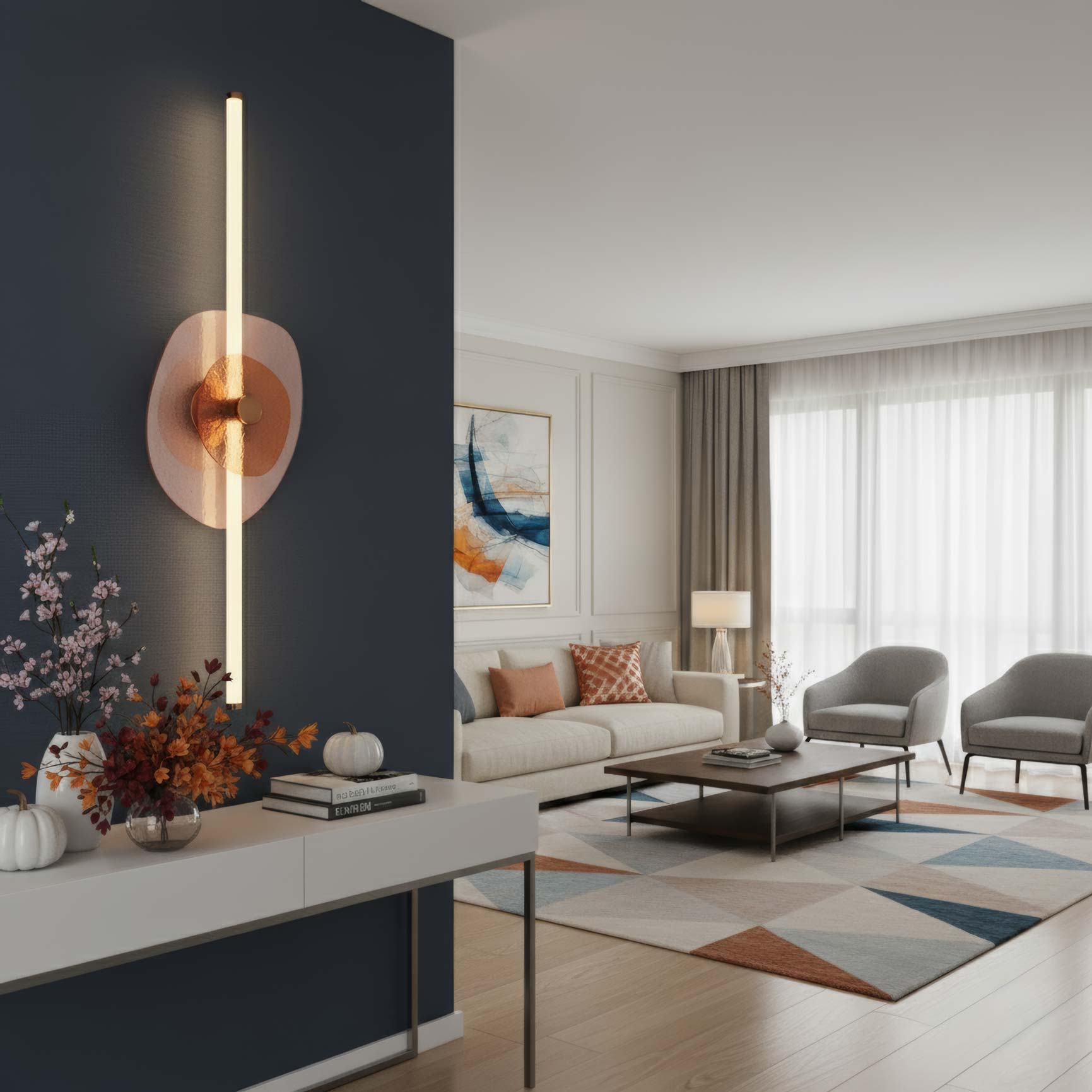 Modern living room with decorative Colorella wall light fixture in Pink seeded glass and Orange Hammered glass in a rose gold finish and stylish furniture.