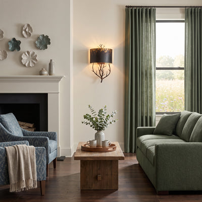 Arboreal 2-light Wall Sconce in Antique Black Iron, AI-visualized room scene - Golden Lighting