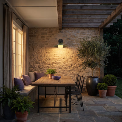 Croma 1-light Outdoor Wall in Matte Black, AI-visualized patio scene - Golden Lighting