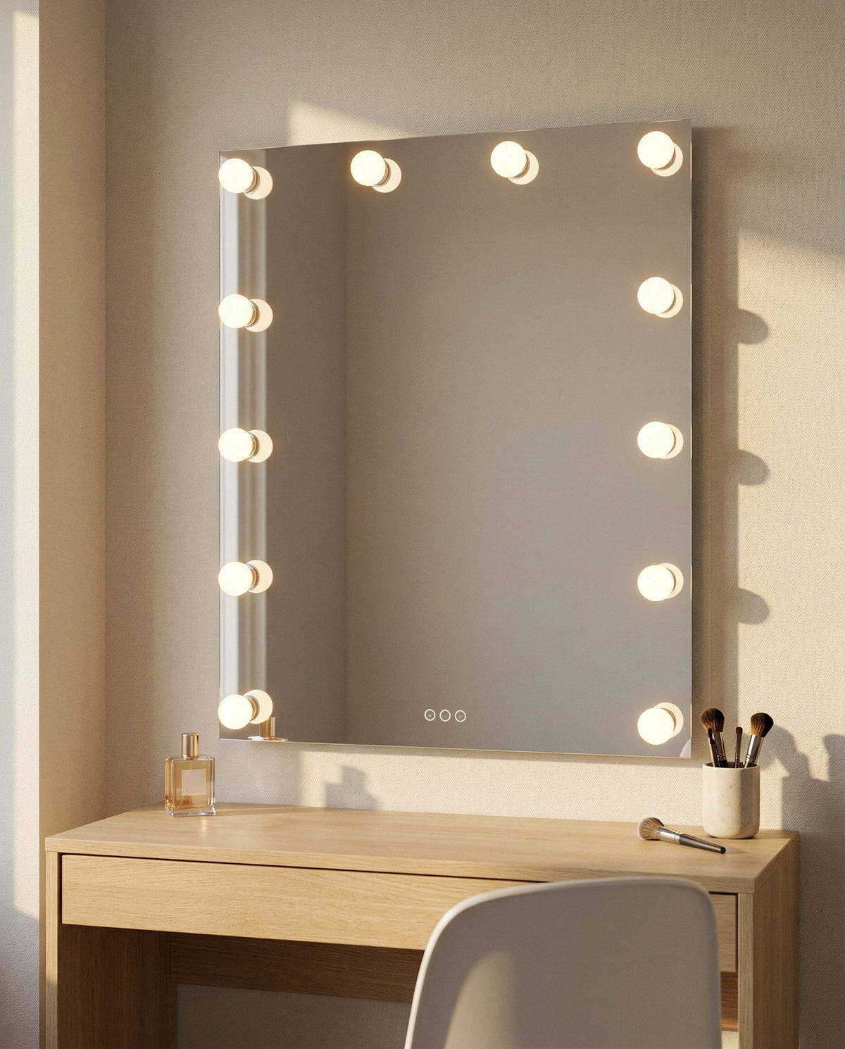 Starlight 30" LED mirror with clear glass globe LED lights over a vanity table with a chair.