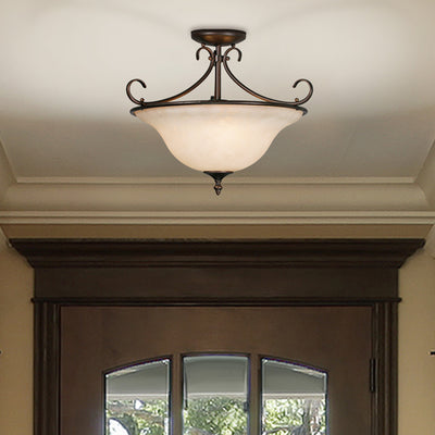 Homestead 3-light Semi-Flush Mount in Rubbed Bronze, shown in a room setting - Golden Lighting