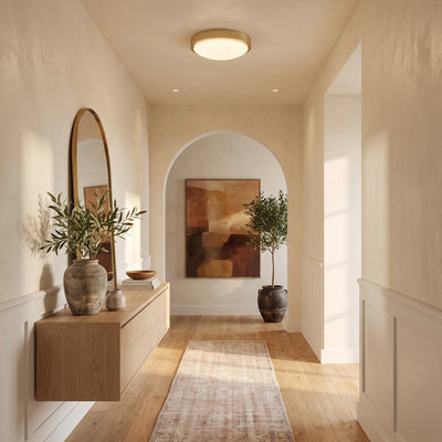 Gabi Integrated LED 10in Flush Mount in Brushed Champagne Brass, AI-visualized hallway scene - Golden Lighting