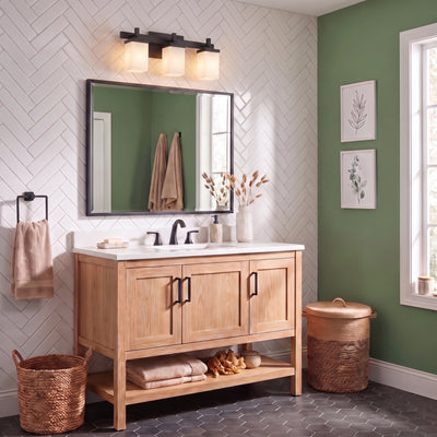 Maddox 3-light Vanity in Matte Black, AI-visualized bathroom scene - Golden Lighting