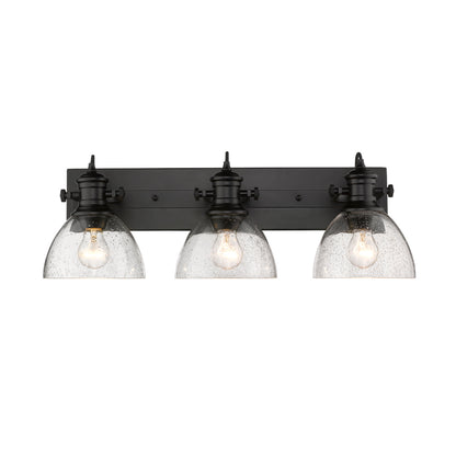 Hines 3 Light Bath Vanity - Matte Black / Seeded Glass - Golden Lighting